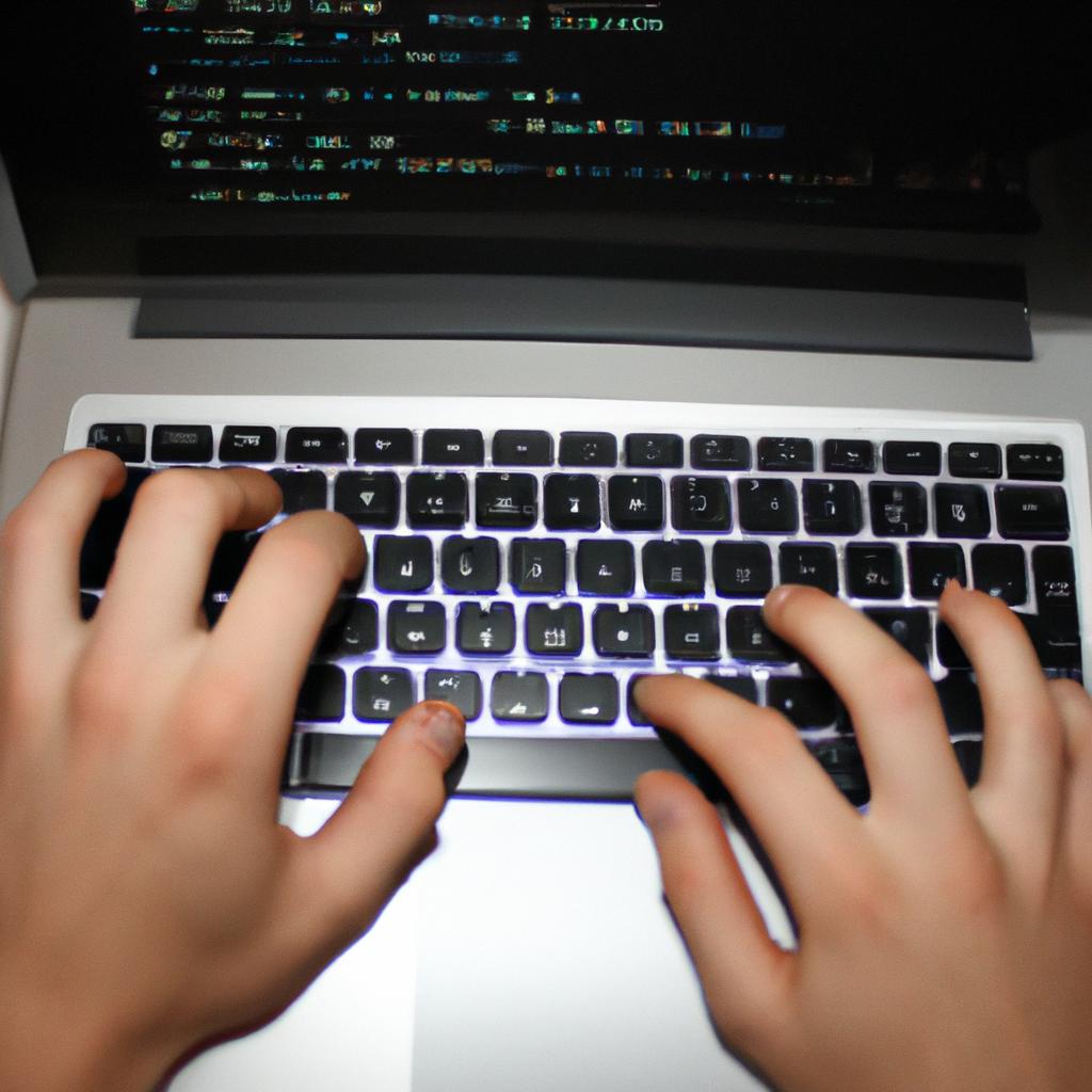 Person coding on a computer